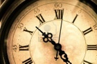 5498580-old-stained-vintage-clock-closeup.jpg